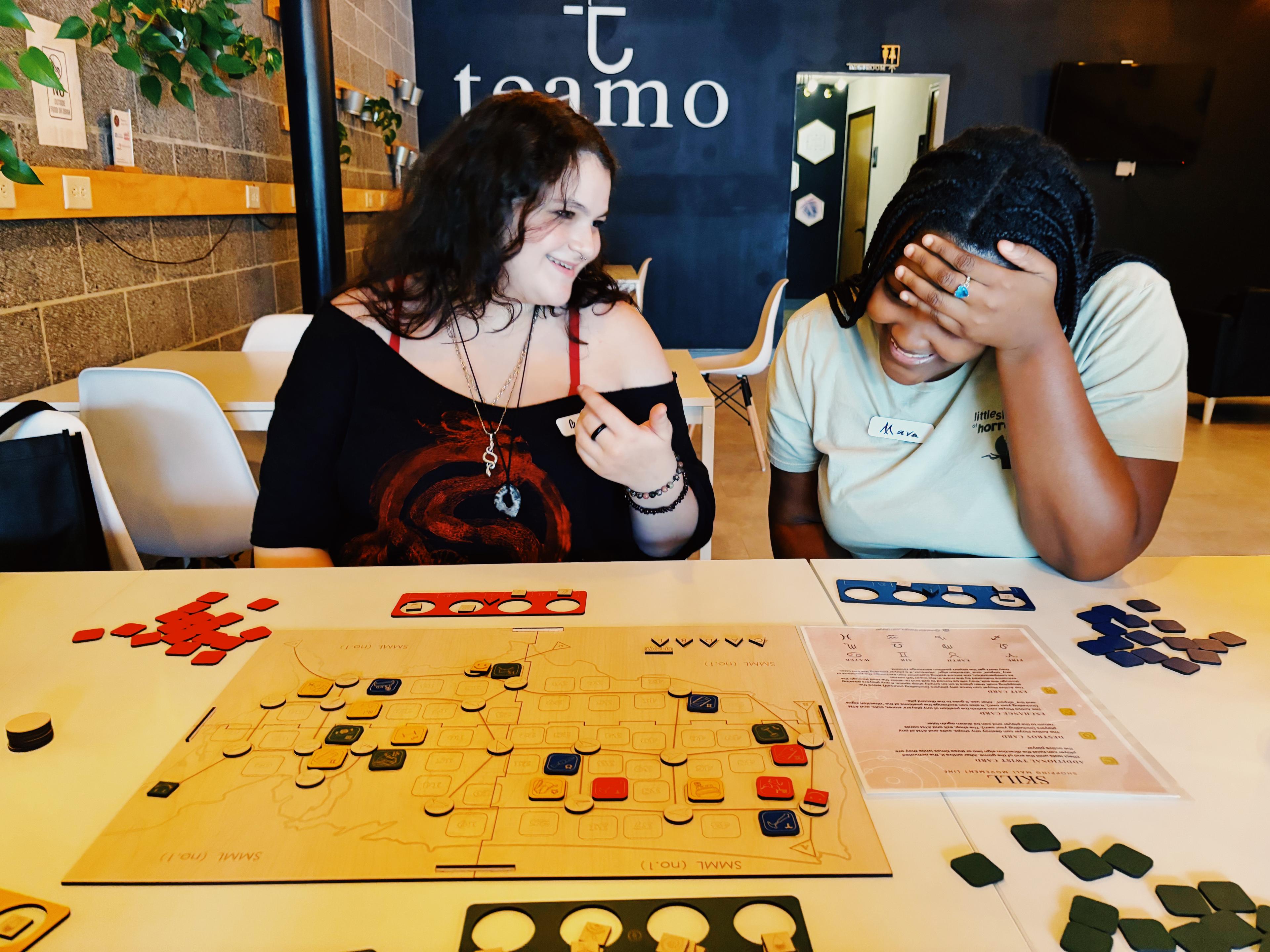 Two players laughing during an SMML game